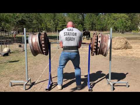 A weightlifter wearing a “GAS STATION READY” shirt