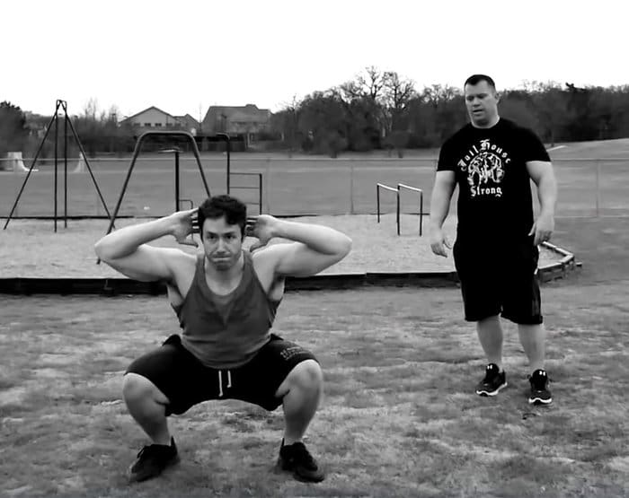 Two men working out at a community park