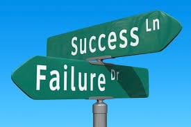 A signboard that reads Success and Failure